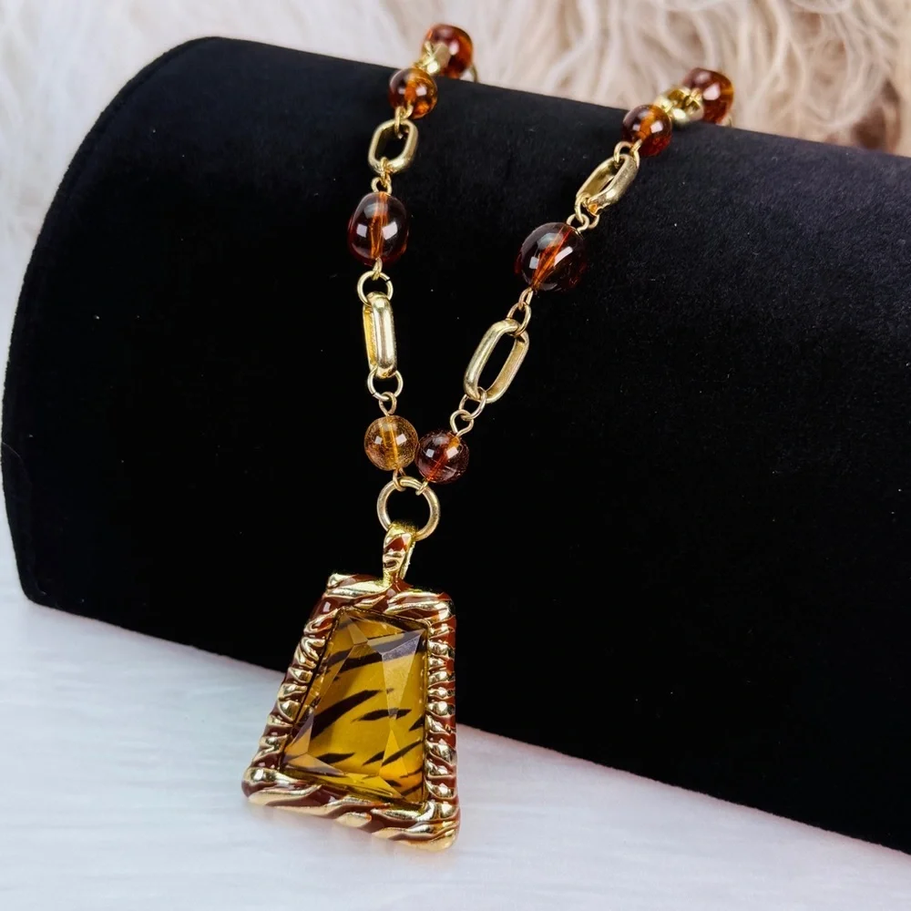 Beautiful, bohemian chic, dressy, animal, print pendant costume necklace